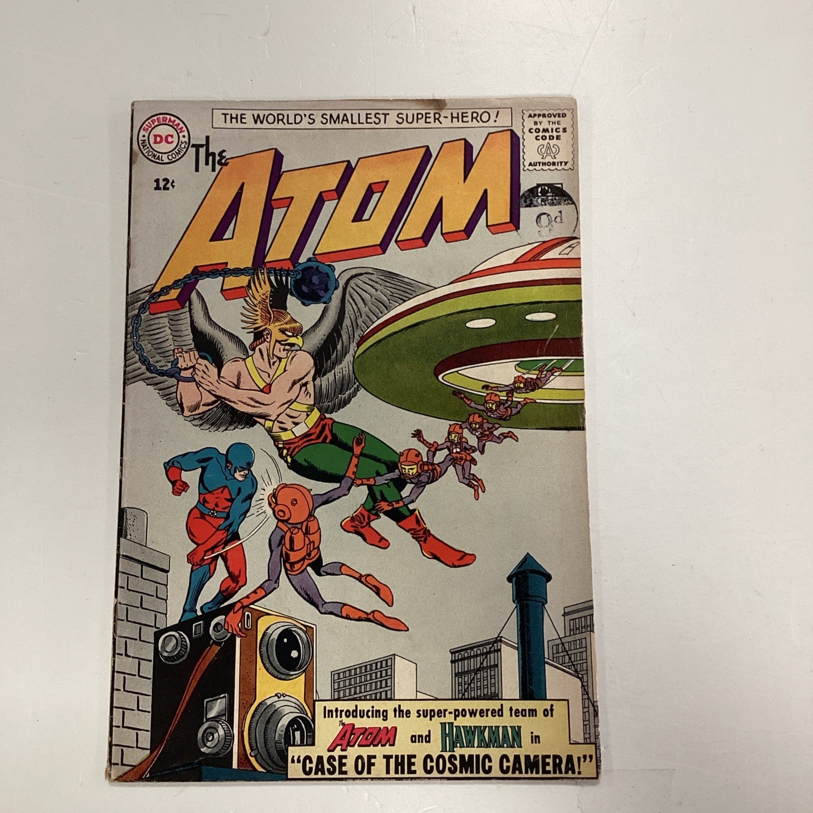 Atom #7 1963 GD/VG Pence Stamp **Water staining, small tearbottom of rear cover0