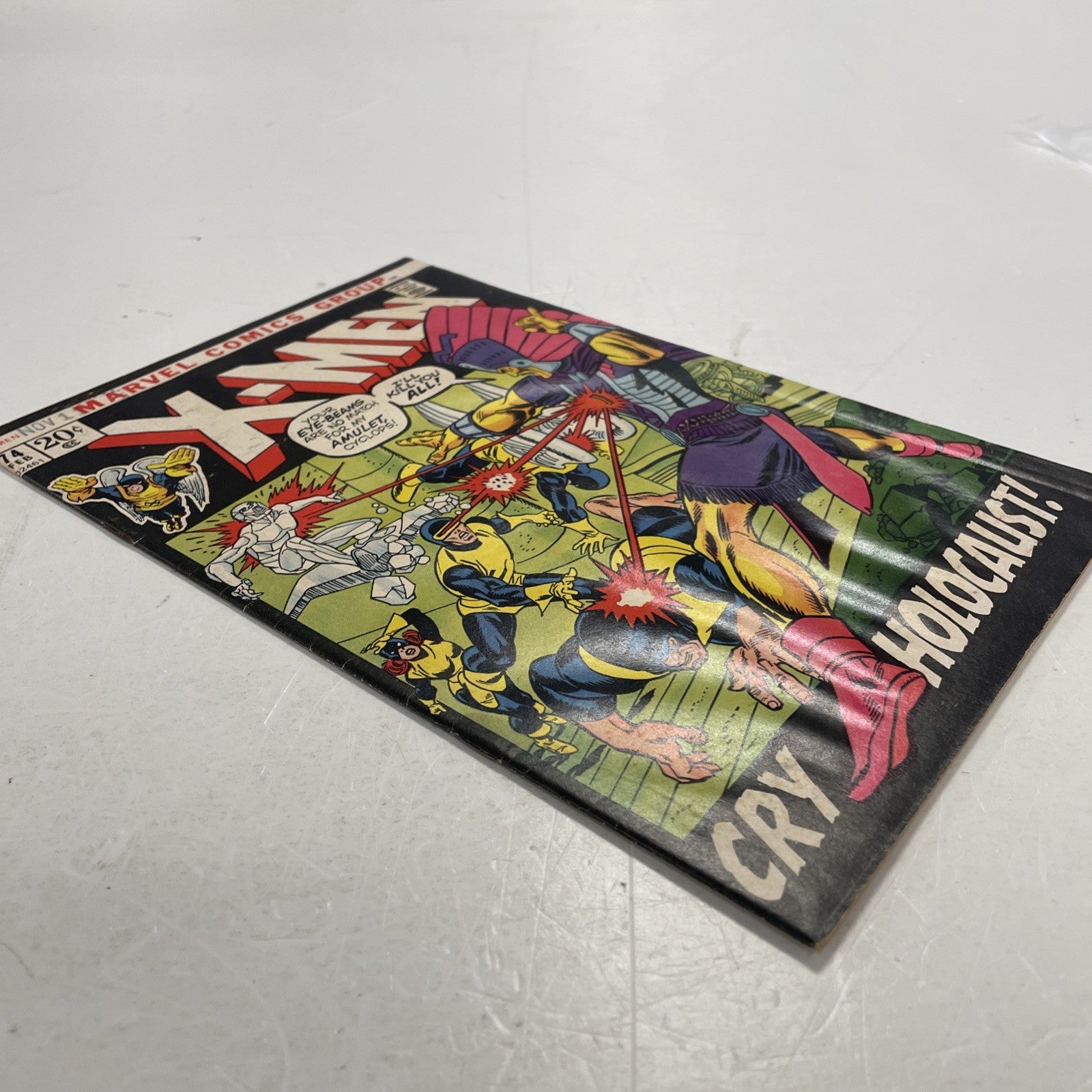 X-Men #74 1972 VG- **Date stamp on cover, rusted staples, water damaged3